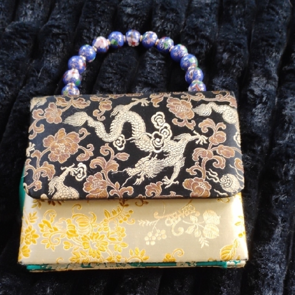 Franchi Elegant Black and Gold Clutch with Floral Pattern